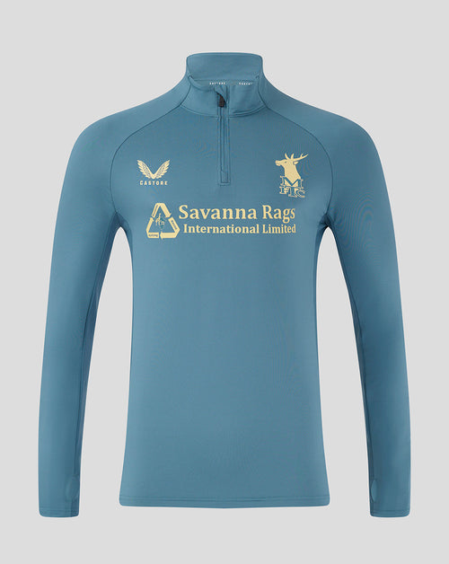 Front view of light blue Mansfield training quarter zip top with funnel collar and crest logos.