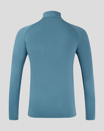 Back view of light blue Mansfield Rise Pro training top with funnel collar and long sleeves.