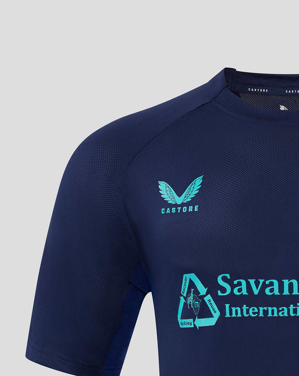 Front close-up of navy Mansfield Training Short Sleeve Tee showing turquoise crest on left chest and Castore branding near the collar