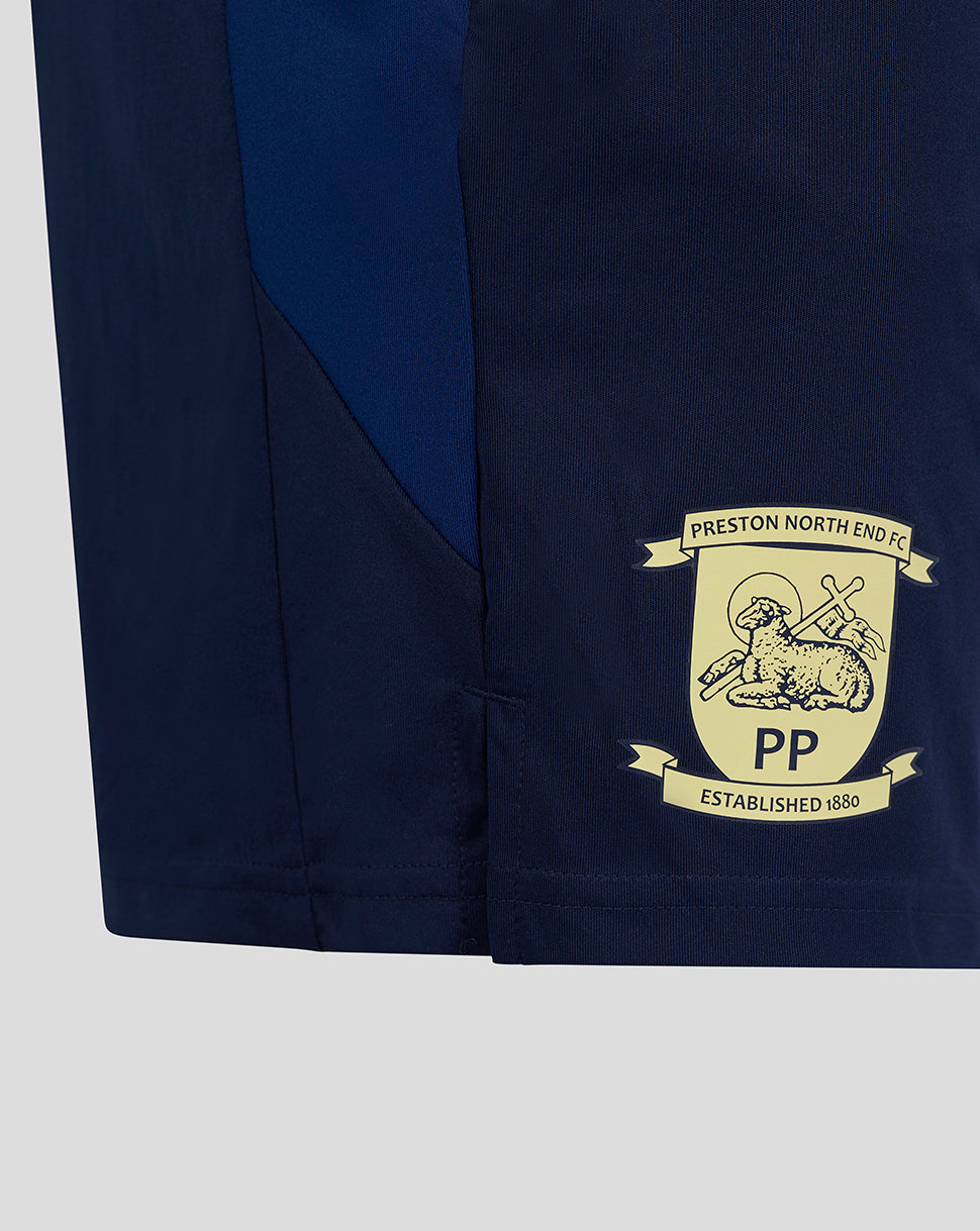 Preston navy training shorts with pockets and beige crest patch at hem