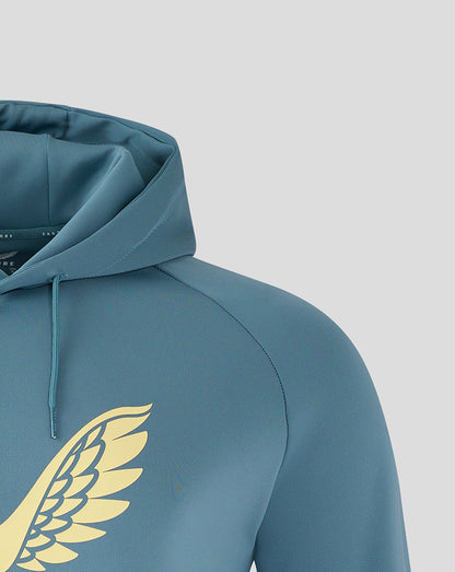 Close-up of hood and shoulder on light blue Travel Hoody with teal drawstrings and visible partial logo.