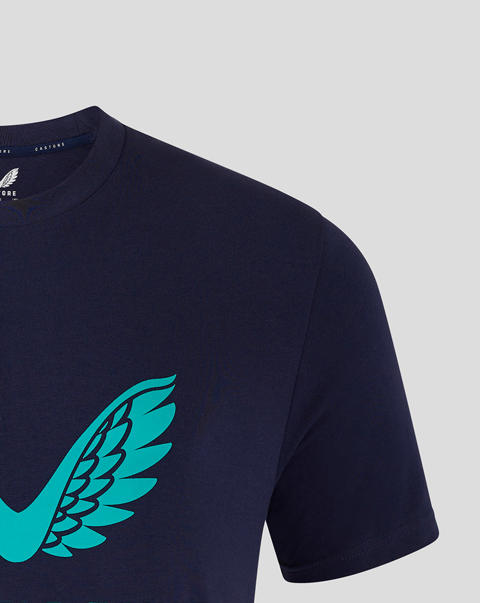 Close up of navy Mansfield rise pro shirt showing turquoise wing graphic across the chest and crew neck