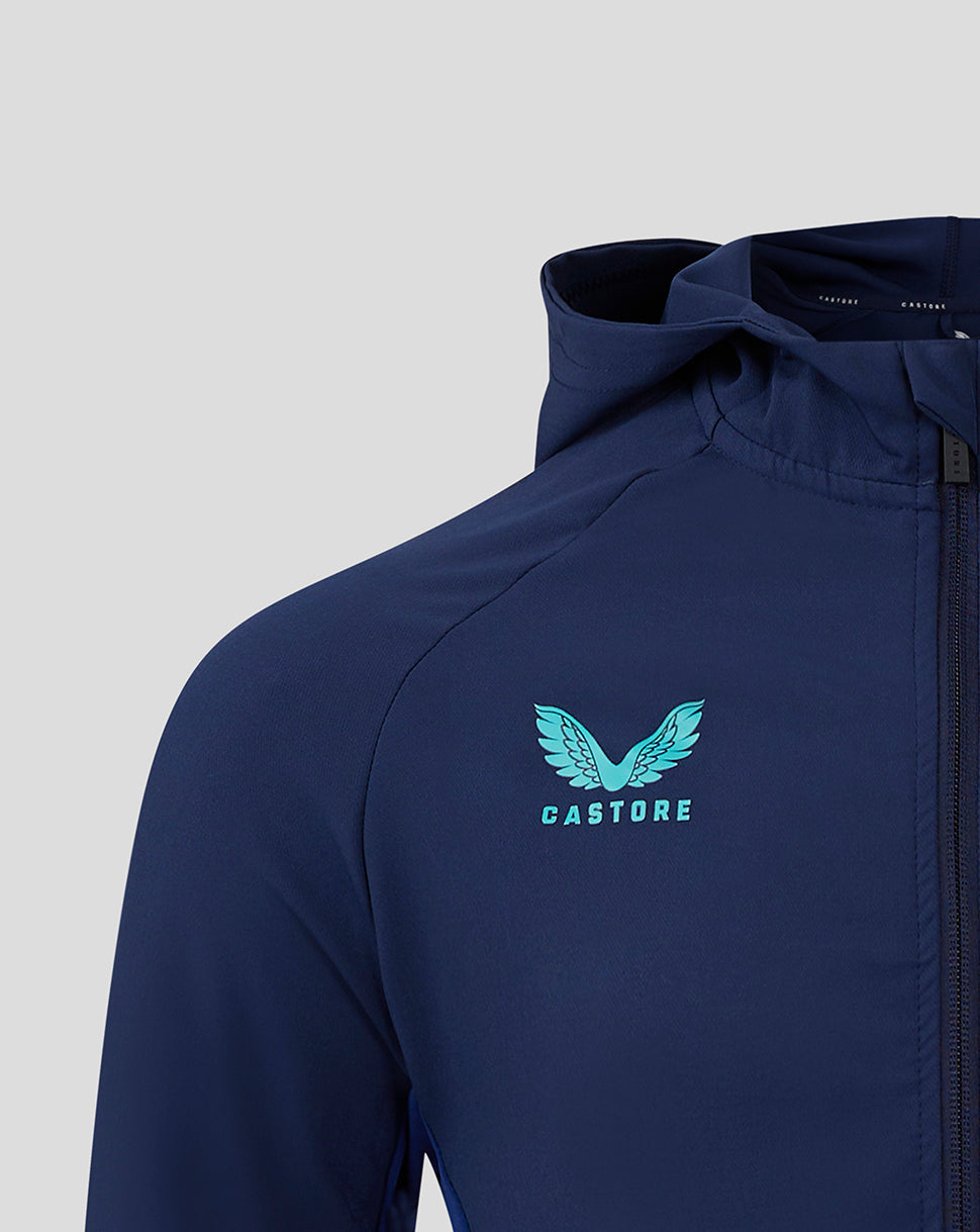 Navy Mansfield hooded jacket close-up showing teal wing crest on left chest and front zipper