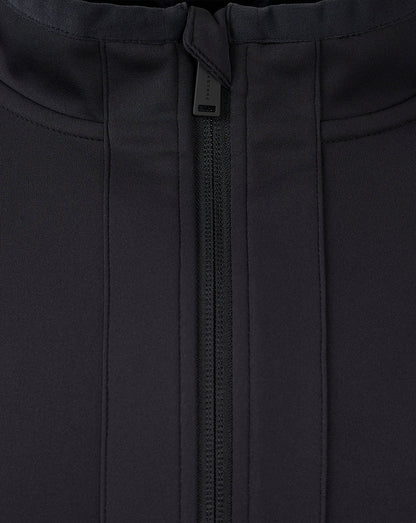 Close-up of the center front zipper and waist drawstring on the jacket