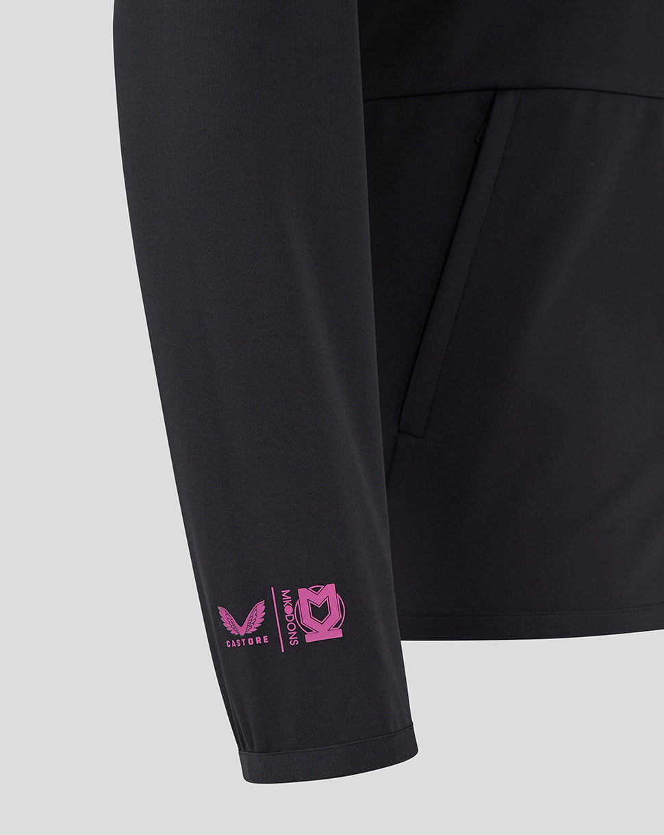 Sleeve detail with pink Castore Mk Dons logos near the cuff