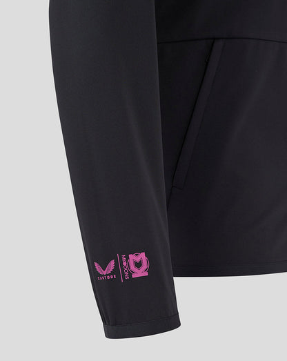 Sleeve detail with pink Castore Mk Dons logos near the cuff