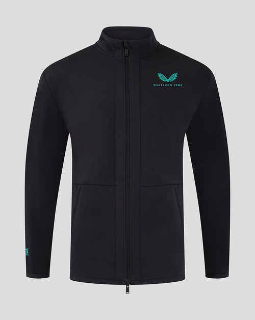 Front view of Mansfield Men's 24/25 Travel Jacket in black with teal logo on the left chest.