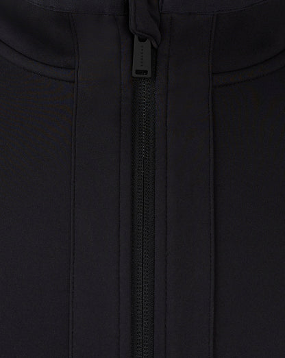 Close up of the central zipper and pull on the black Mansfield travel jacket.