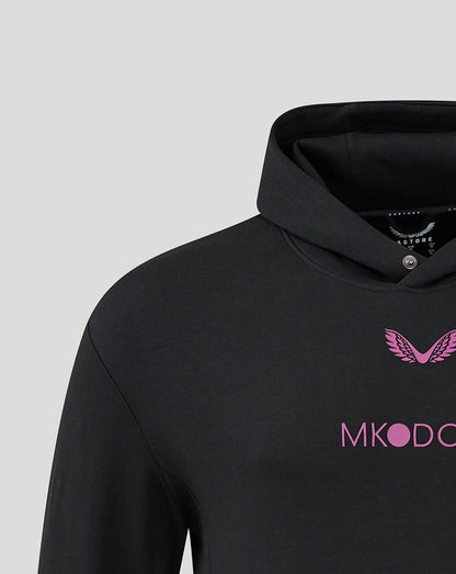 Close up of chest area showing pink MK Dons logo with wing emblem on black hoody