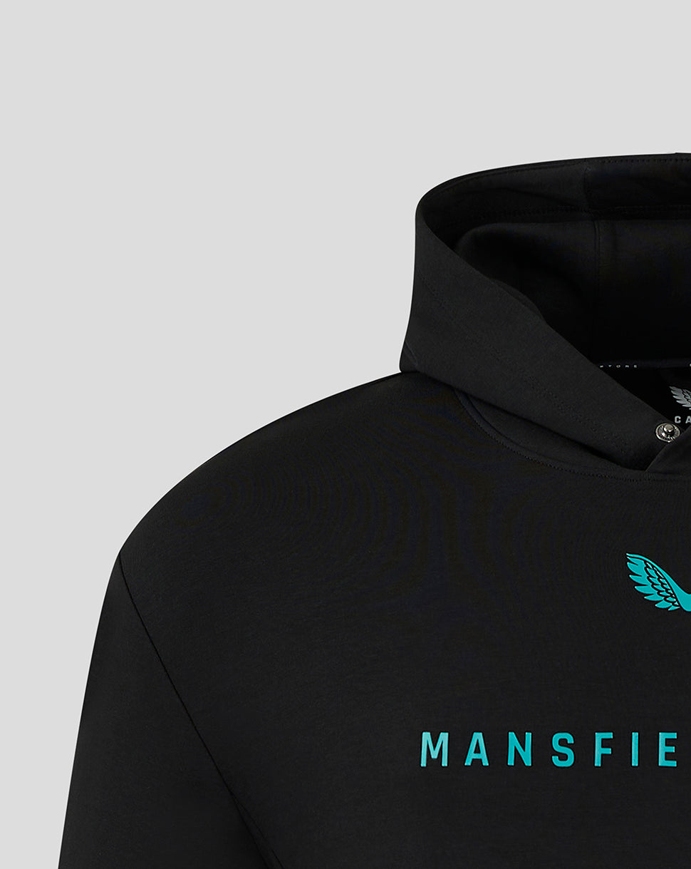 Chest area of black Mansfield travel hoody with turquoise wing logo and bold Mansfield text.