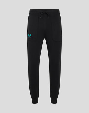 Black Mansfield travel pants with a drawstring waist and teal logo on the left thigh.