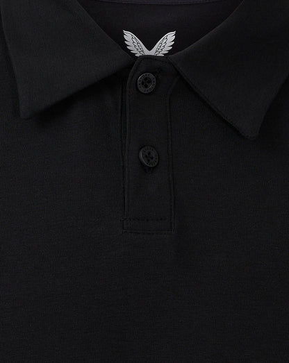 Close-up of black polo collar with two-button placket and white wing emblem at the neckline.