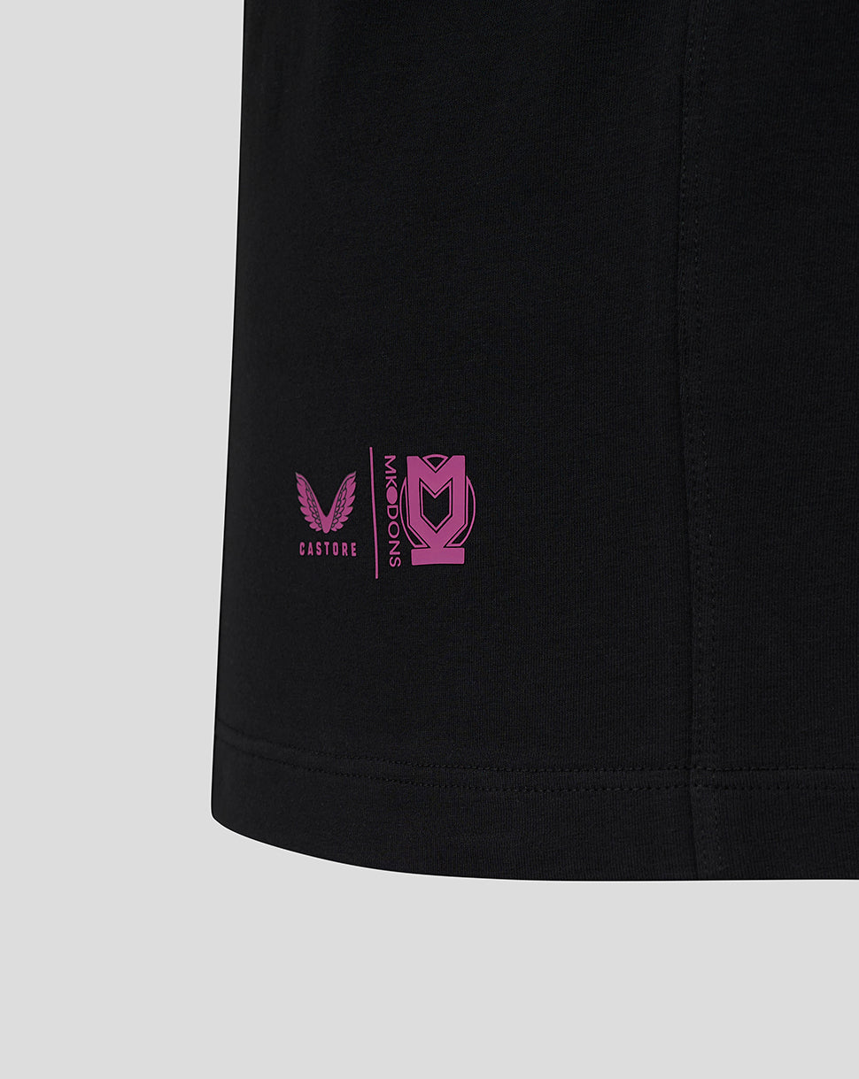 Pink Castore and Mk Dons logos near the bottom hem of the polo