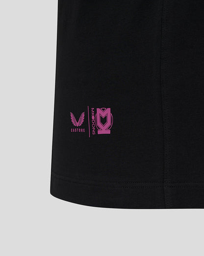 Pink Castore and Mk Dons logos near the bottom hem of the polo