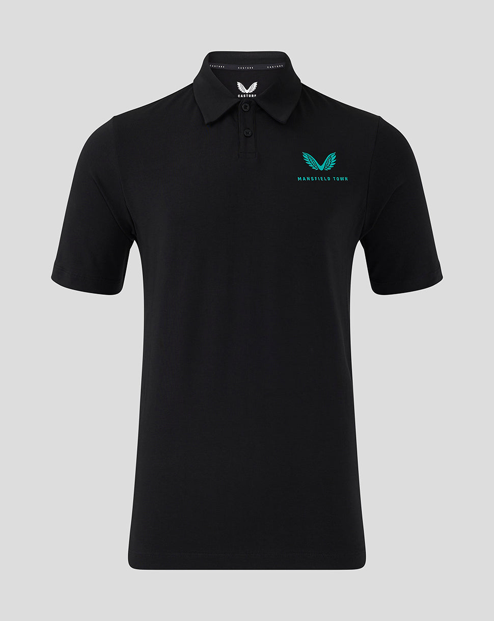 Black Mansfield Town travel polo shirt shown front view with teal emblem on left chest