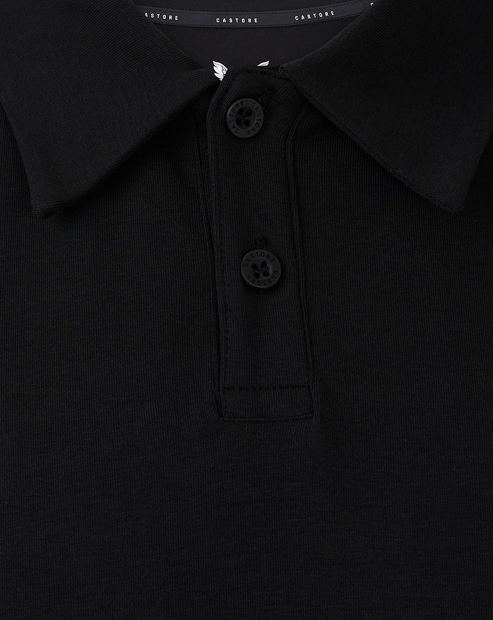 Close up of black polo collar with two buttons and knit placket