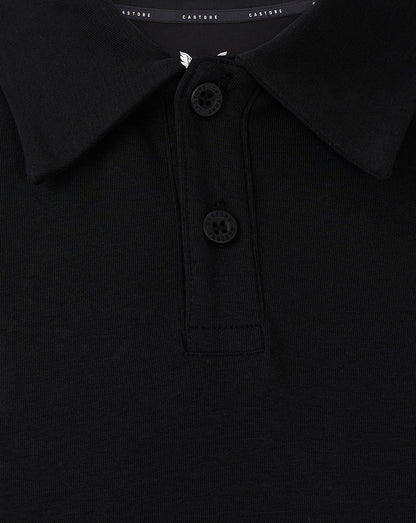 Close up of black polo collar with two buttons and knit placket