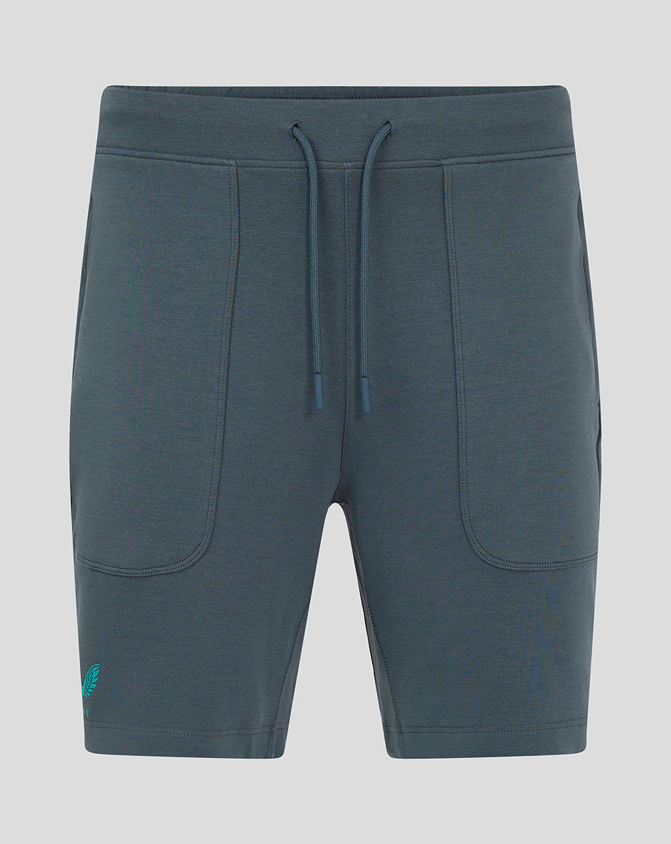 Front view of teal Preston NE Travel Shorts with drawcords and zip pockets, showing the Castore PNE logo on the right thigh.