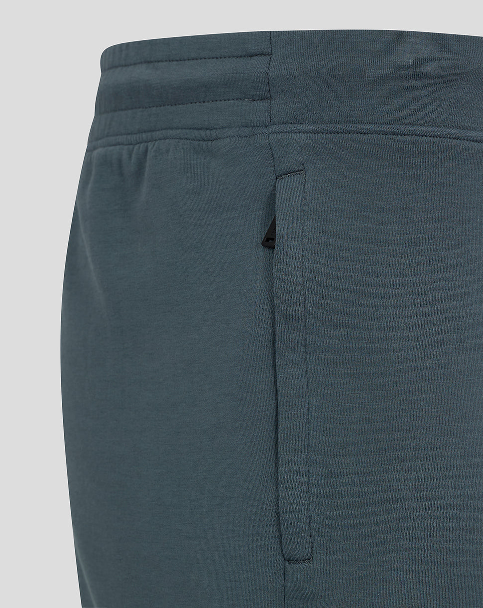 Close-up of blue Preston NE Travel Shorts showing a side seam zip pocket and stitched details