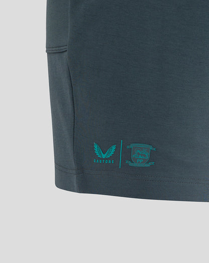 Rear left hem shows teal PNE crest and Castore logo on Preston NE Travel Shorts.