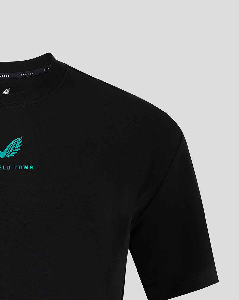 Mansfield Men's 24/25 Travel Tee in black with turquoise wing logo on the chest
