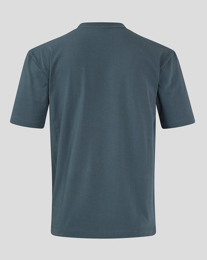Back view of Preston NE Travel Short Sleeve T Shirt in blue with a relaxed oversized fit.