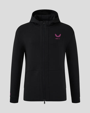 Front view of black Mk Dons Men's 24/25 hooded travel jacket with zip and pink logo on chest