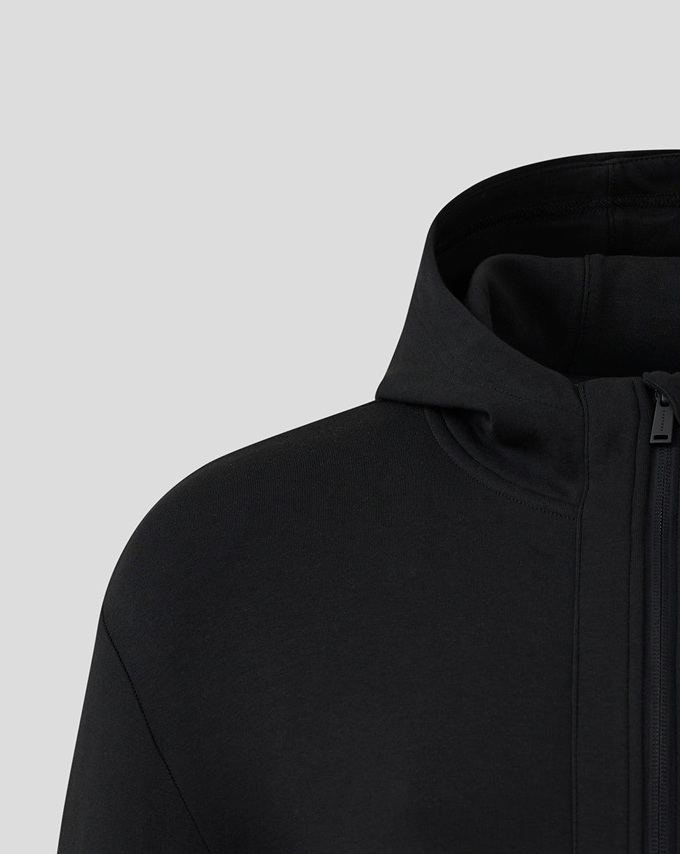 Close-up of black hood and front zipper on Mk Dons travel jacket