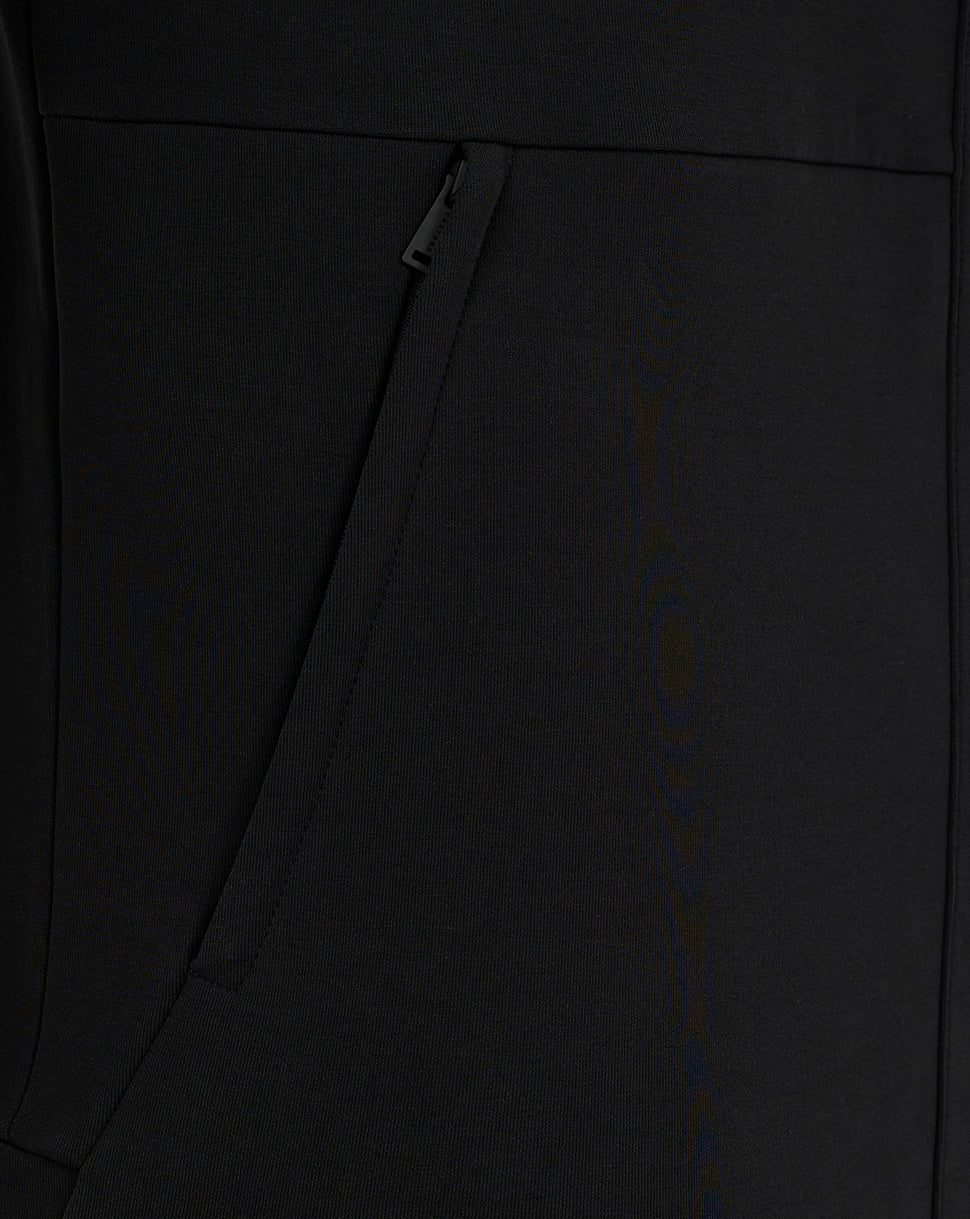 Side zip pocket on black Mansfield travel jacket