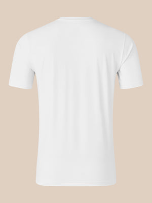 Back view of white short sleeve T shirt with crew neck on beige background.