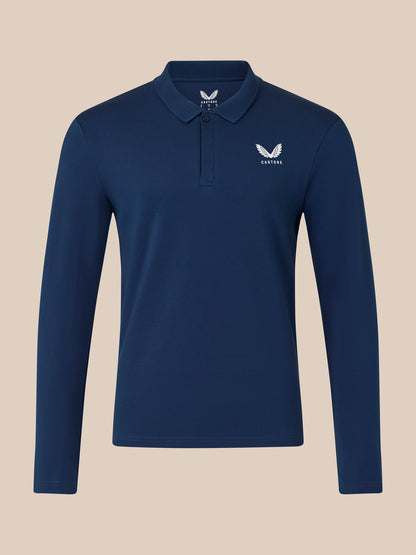 Navy long sleeve polo with white embroidered wing crest on left chest