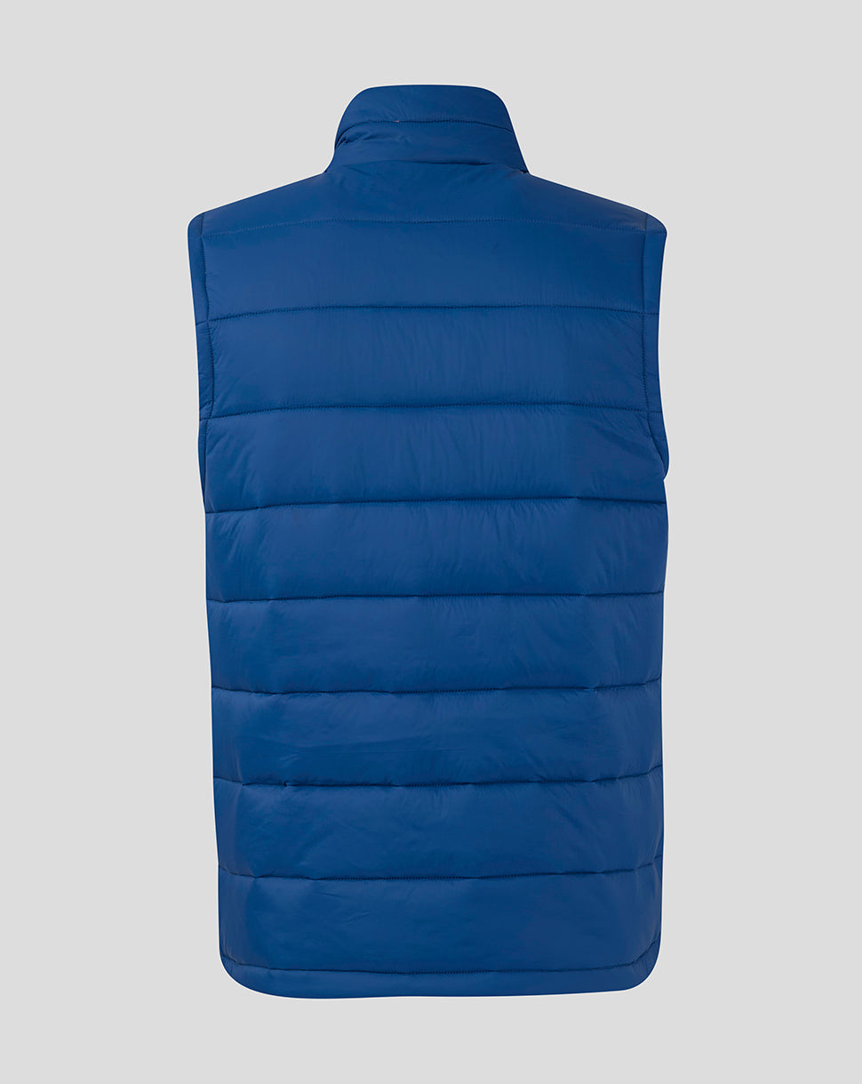 Back view of blue padded sleeveless gilet with horizontal quilting.