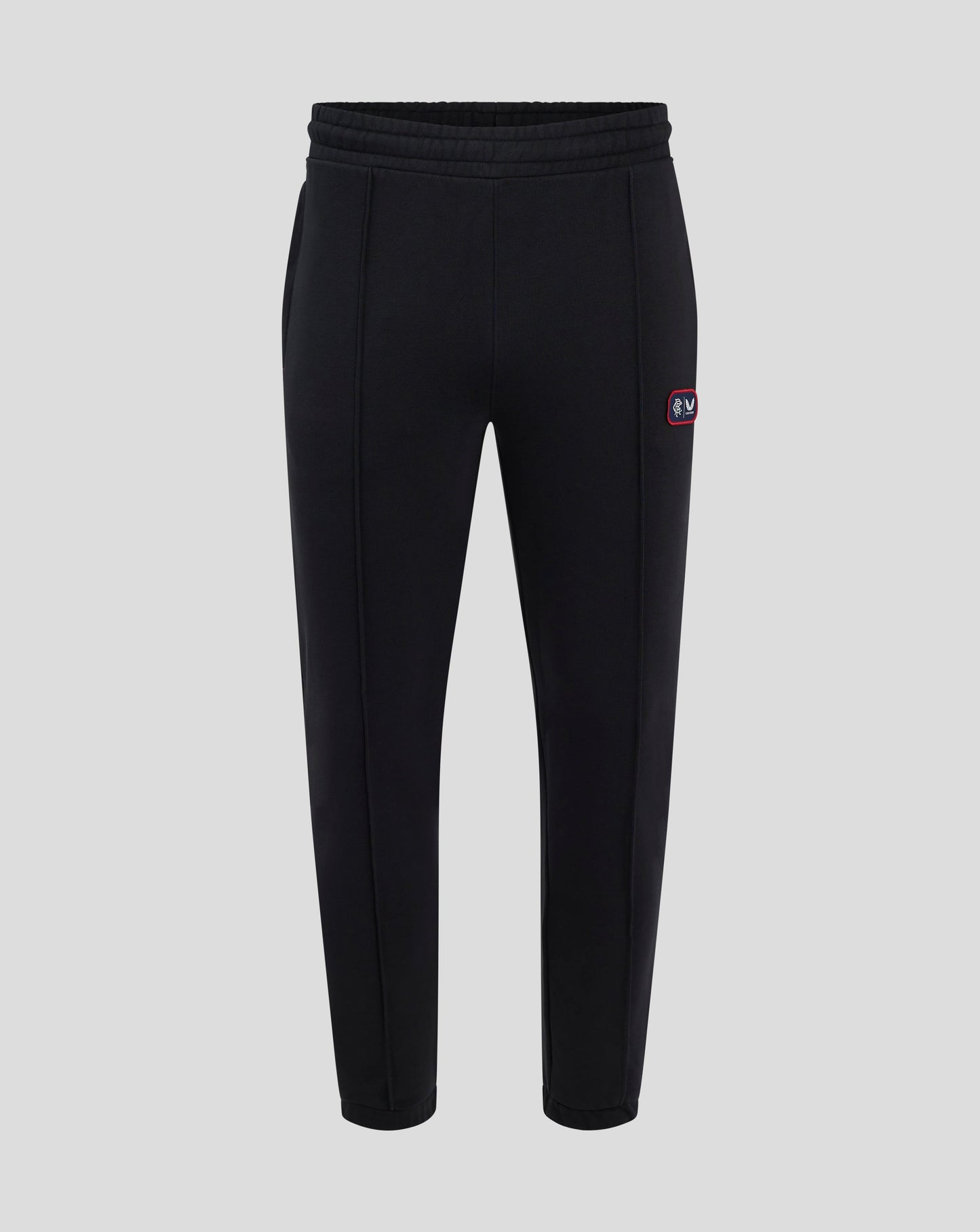 Front view of black Rangers FC lifestyle joggers showing a dual badge on the left thigh.
