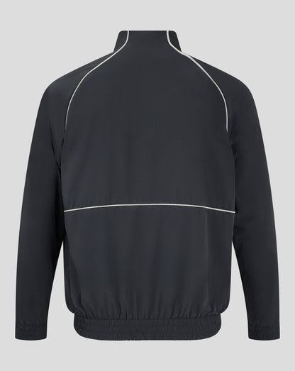 Back view of navy Rangers track jacket displaying white piping along shoulder seams and elastic hem