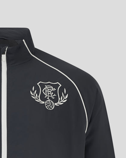 Close up of navy Rangers Track Jacket showing the embroidered crest on the chest and white piping along the shoulder