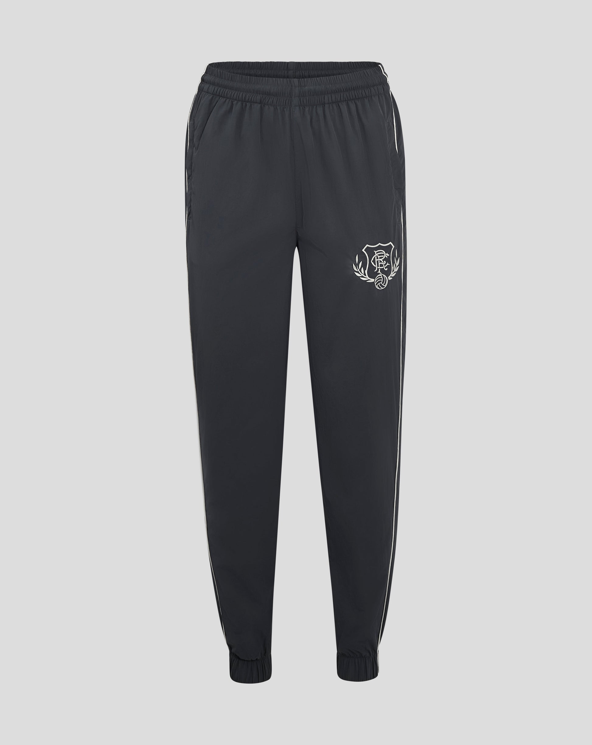 Navy Rangers FC track pants with elastic waistband and knotted drawcords, white side piping and left thigh crest.