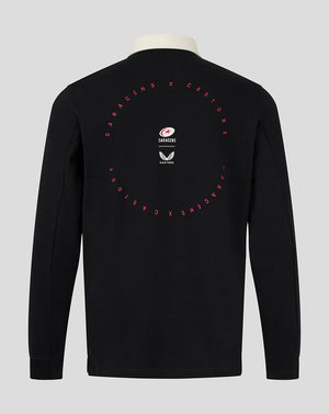 Back view of black Saracens rugby jersey with circular red text design and small logos on the upper back