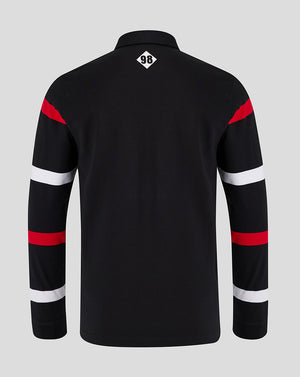 Back view of black Saracens retro rugby jersey with red and white sleeve stripes and a small 98 diamond at the neck
