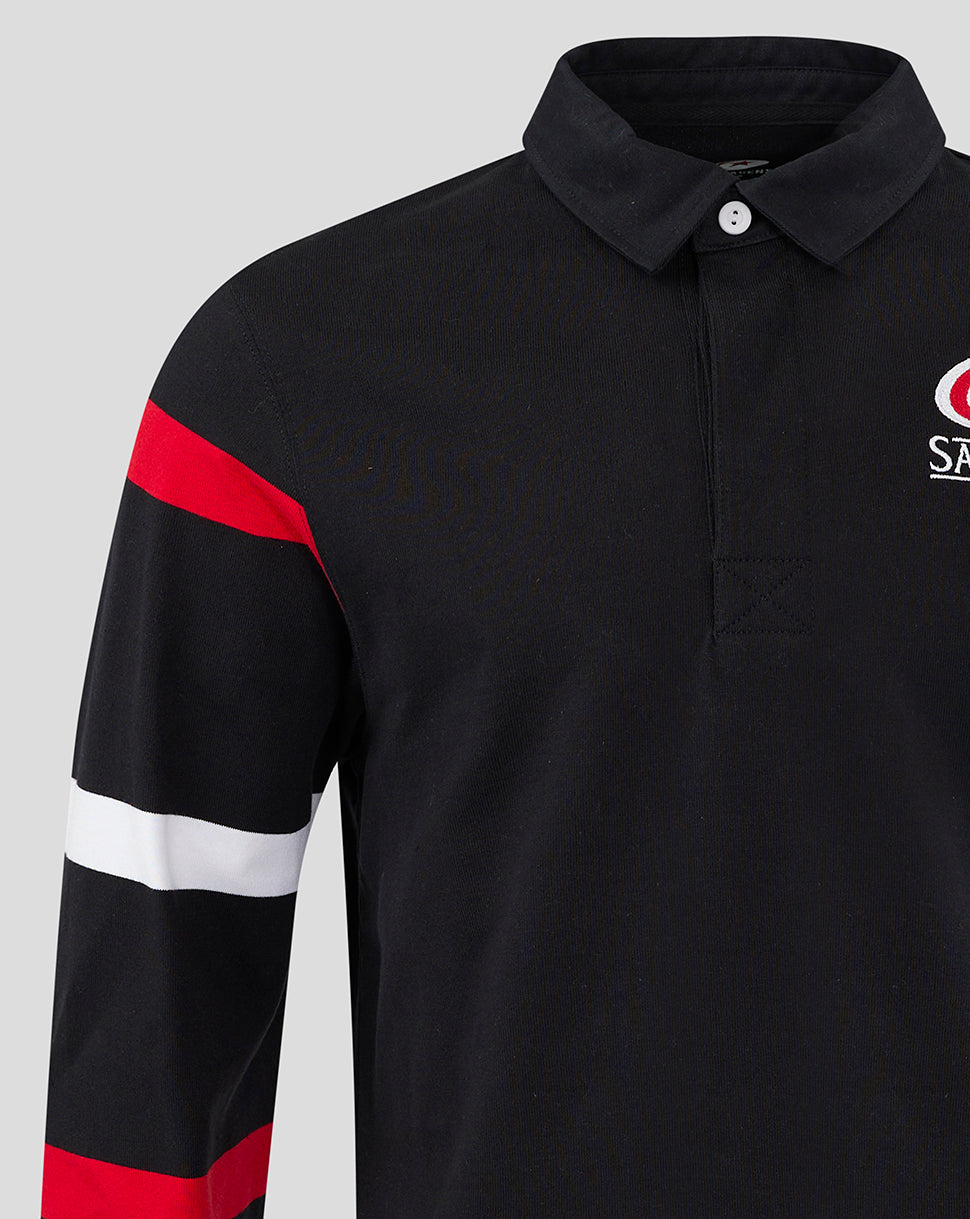 Collar detail with white button and left chest Saracens logo on black jersey, red sleeve stripe visible