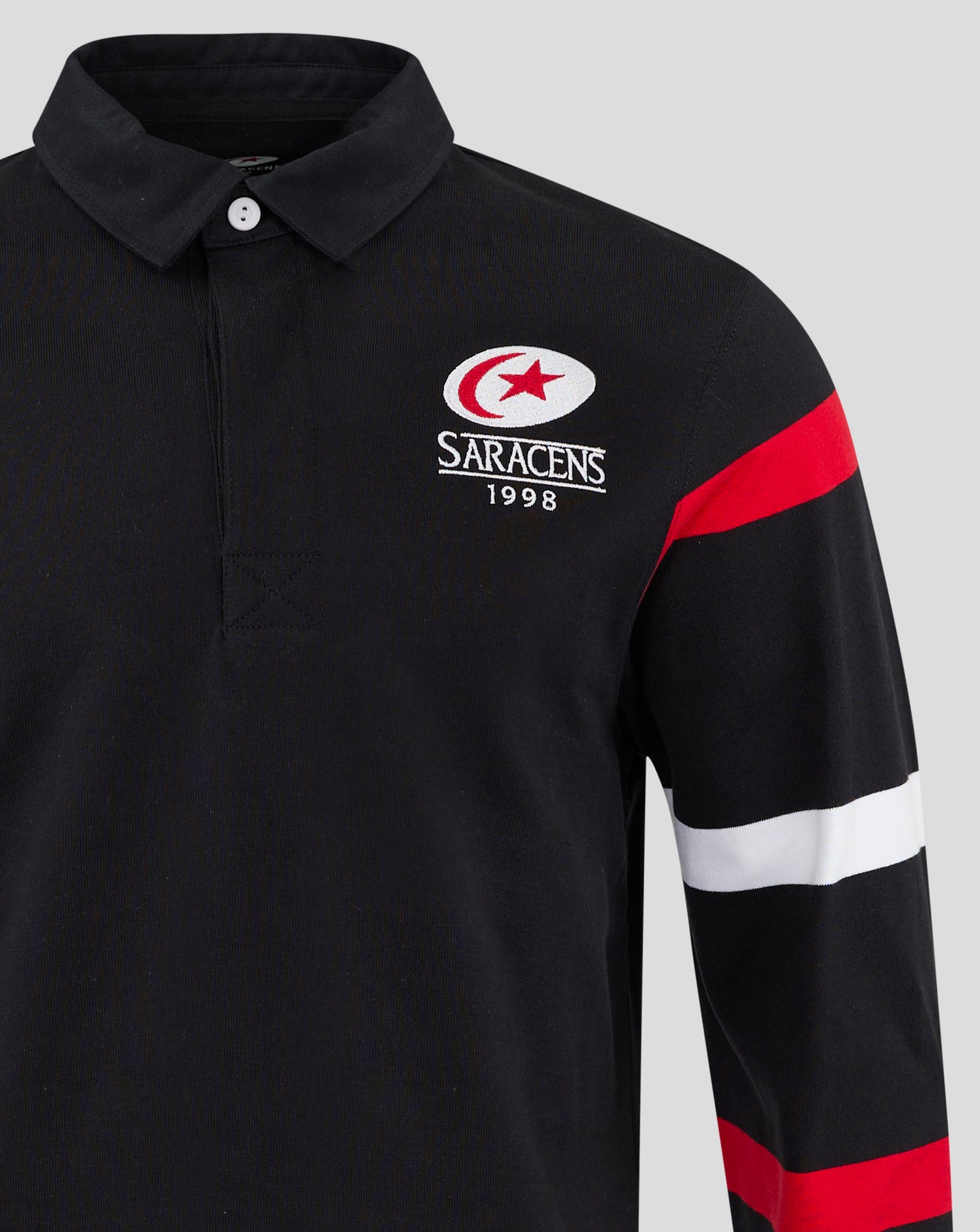 Left chest embroidered Saracens logo with crescent and star and 1998 text on black rugby jersey
