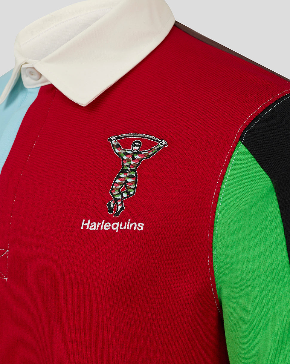 Red Harlequins rugby shirt with white collar and embroidered crest on color-block panels.
