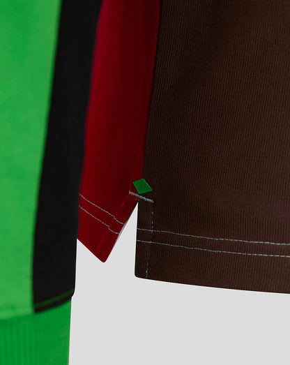 Color-block Harlequins rugby shirt with brown red panels and a small green diamond accent at the hem.