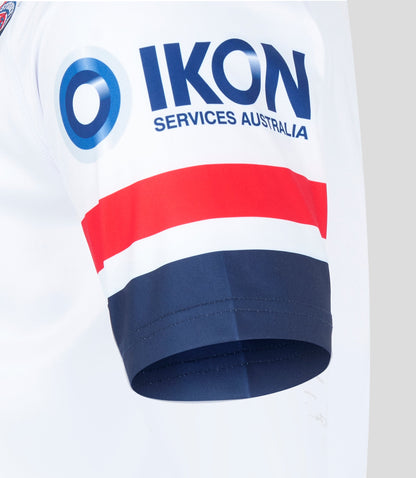 Sydney Roosters away jersey chest featuring Ikon Services Australia logo amid diagonal red and navy chevrons
