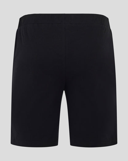 Back view of black Saracens men's short pajama shorts with an elastic waistband.