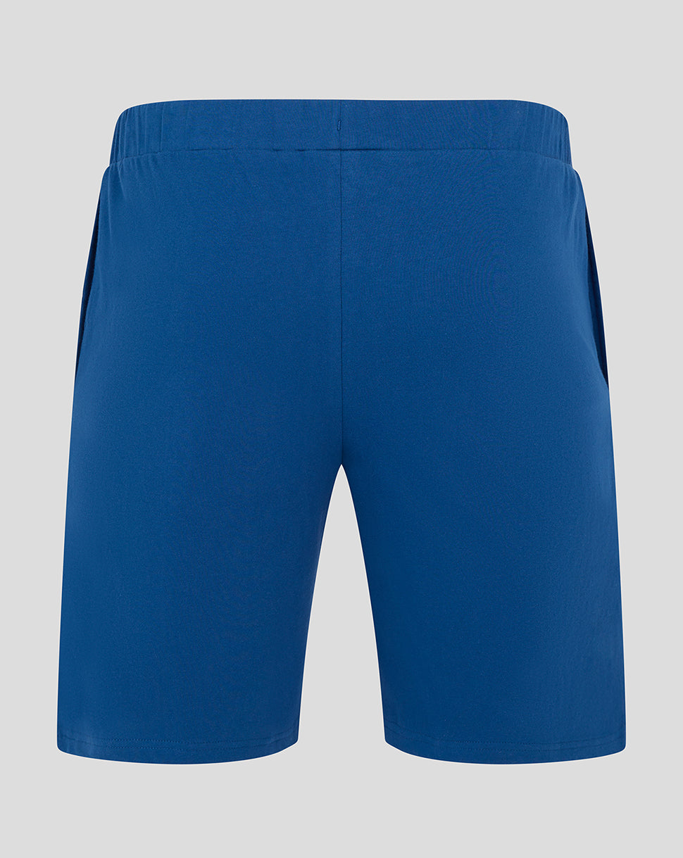 Back view of Bath Rugby Infant Short Pyjama shorts in solid blue with an elastic waistband