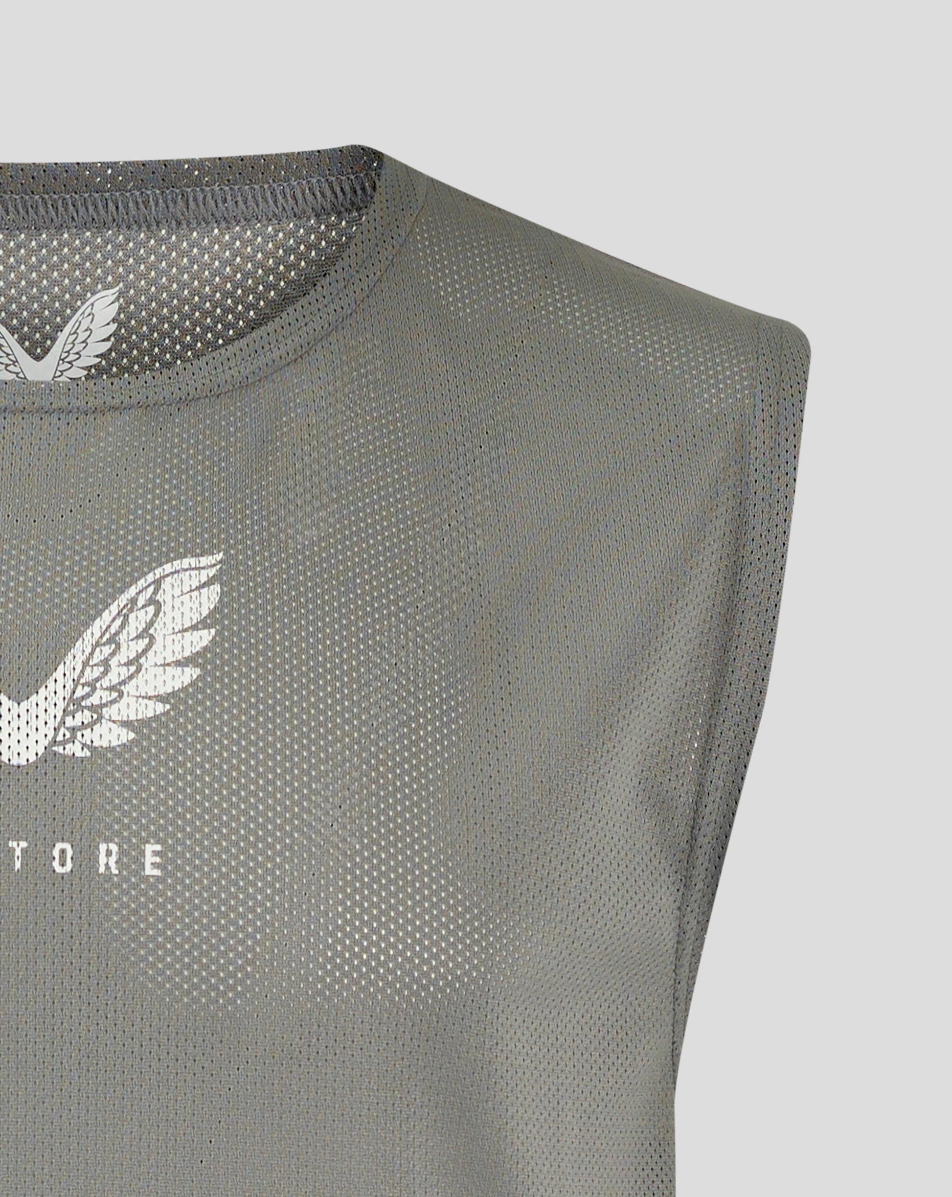Neckline and shoulder seam on sharkskin training bib with self fabric scoop neck