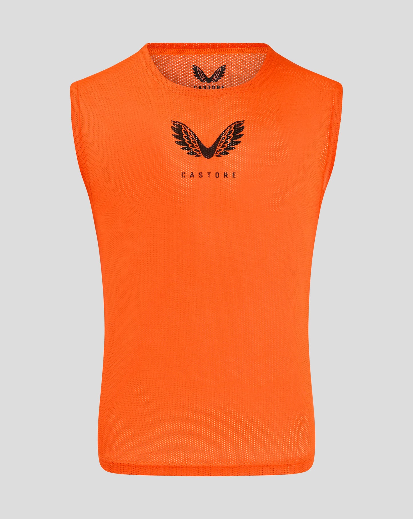 Front view of bright orange junior training bib with Castore logo on chest