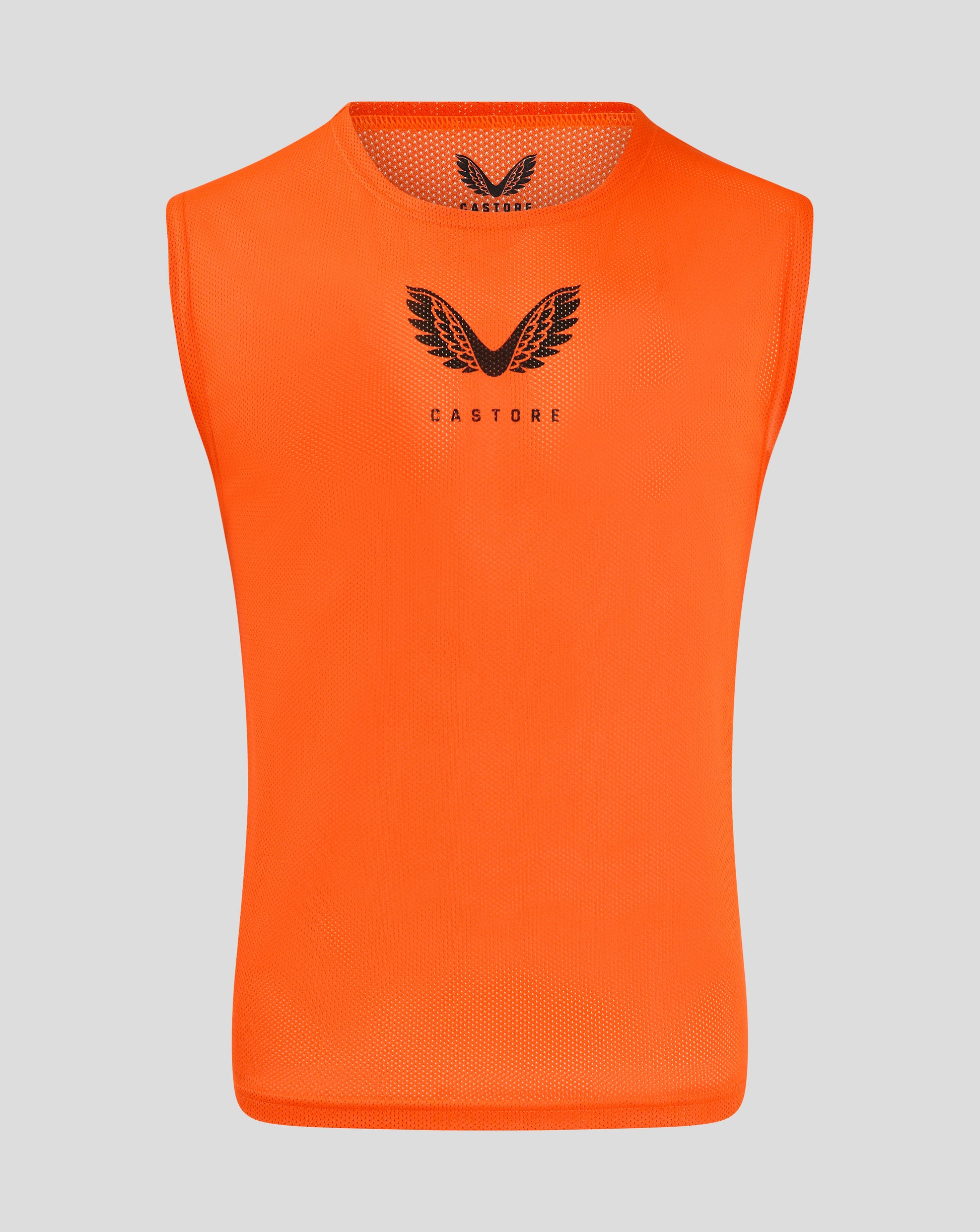 Front view of bright orange junior training bib with Castore logo on chest