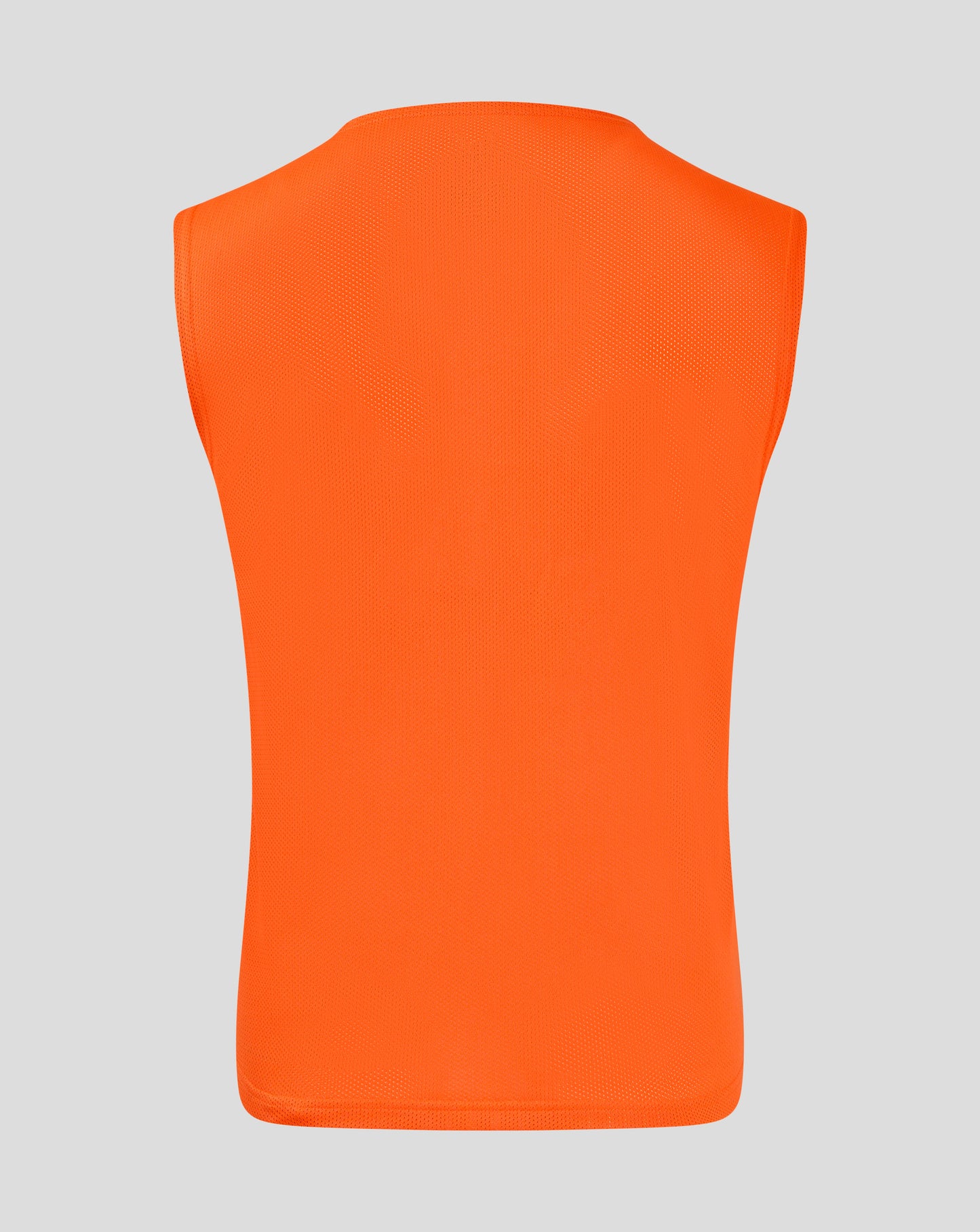 Back view of orange training bib showing mesh fabric and bound armholes