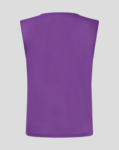 Back view of purple unisex training bib showing bound neckline and mesh interior